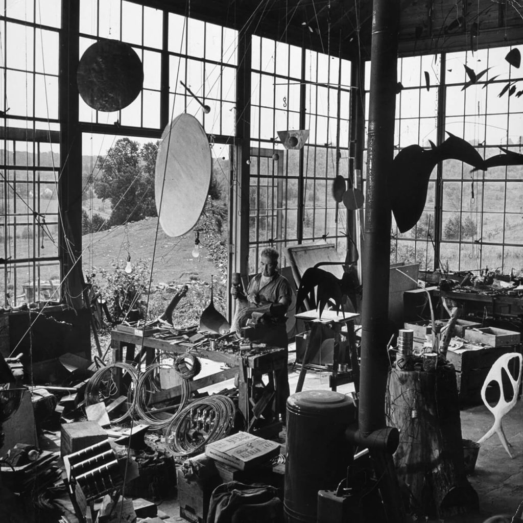 Calder with Red Disc and Gong (1940) and Untitled (c. 1940) in his Roxbury studio, 1944. Photograph by Eric Schaal © Life Magazine