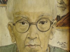 《緑の服を着た自画像》1954年 Autoportrait en vert © Fondation Foujita / ADAGP, Paris & JASPAR, Tokyo, 2024 G3467