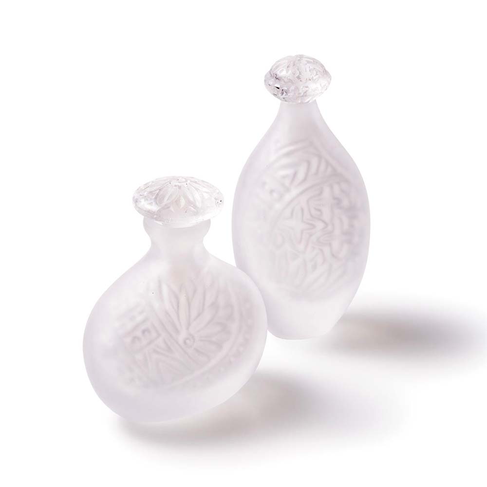 大谷佳子(ガラス)
飾り瓶「空に花・命の器」
(奥)縦5×横7×高さ15cm、(手前)縦6×横10×高さ12cm