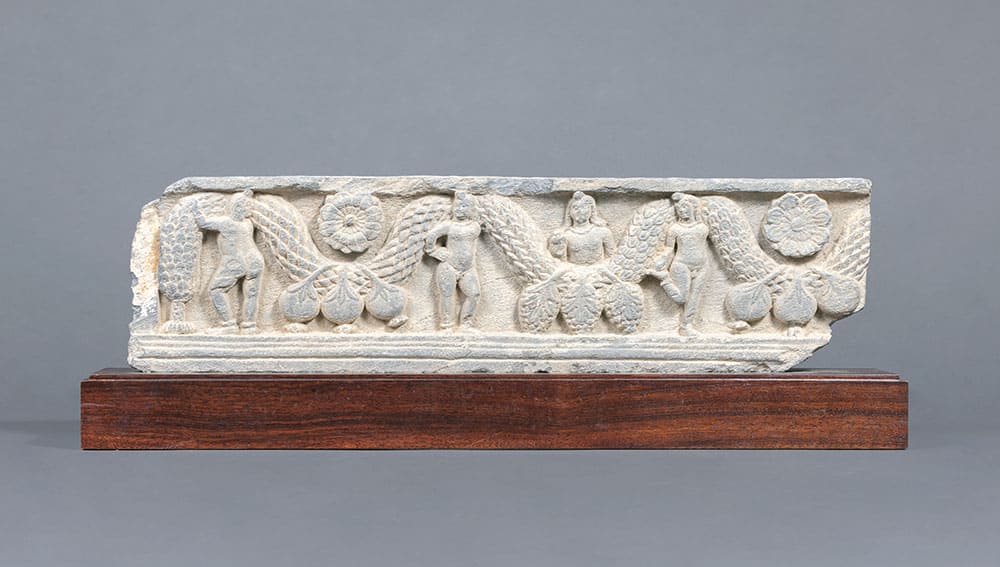 花綱をかつぐ童子　ガンダーラ　２～４世紀　龍谷大学